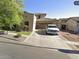 Charming home with a two-car garage and well-manicured front yard at 13687 N 151St Ln, Surprise, AZ 85379