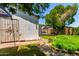 View of the backyard with a shed and covered patio, offering a private outdoor space at 1509 E Verlea Dr, Tempe, AZ 85282