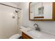 Bathroom with standing shower, toilet and sink with vanity and a mirror at 1509 E Verlea Dr, Tempe, AZ 85282
