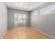 Bedroom featuring a bay window and wood floors at 1509 E Verlea Dr, Tempe, AZ 85282