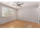 Bedroom featuring window, ceiling fan and wood floors at 1509 E Verlea Dr, Tempe, AZ 85282