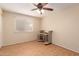 Bedroom featuring wood floors, a ceiling fan and a window at 1509 E Verlea Dr, Tempe, AZ 85282