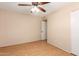 Bedroom featuring wood floors, a ceiling fan and closet at 1509 E Verlea Dr, Tempe, AZ 85282