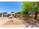 Charming single-story home with a well-maintained front yard and mature landscaping at 1509 E Verlea Dr, Tempe, AZ 85282
