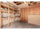 Garage with shelving and visible beams offering ample storage space at 1509 E Verlea Dr, Tempe, AZ 85282