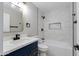 Stylish bathroom with modern fixtures, tub, and elegant vanity at 1530 W Glenrosa Ave, Phoenix, AZ 85015