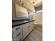 Bathroom vanity features a modern sink, fixtures, and spacious storage at 15334 W Acapulco Ln, Surprise, AZ 85379