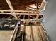 Damaged ceiling with visible wood beams and missing drywall at 15334 W Acapulco Ln, Surprise, AZ 85379
