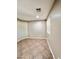Neutral bedroom features carpeted floors and a window at 16176 W Lisbon Ln, Surprise, AZ 85379
