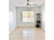 This dining area features a large window that provides ample natural light at 16176 W Lisbon Ln, Surprise, AZ 85379