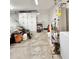 This garage features built in cabinets and a water heater at 16176 W Lisbon Ln, Surprise, AZ 85379