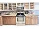 Well-equipped kitchen boasting ample cabinet space, granite countertops, and stainless-steel appliances at 16176 W Lisbon Ln, Surprise, AZ 85379