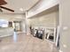 Open living room featuring high ceilings and neutral-colored walls, ready for personalization at 16176 W Lisbon Ln, Surprise, AZ 85379