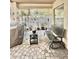 Relaxing outdoor patio with furniture, plants, and a barbecue at 16176 W Lisbon Ln, Surprise, AZ 85379