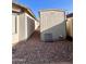This side yard features a shed and gravel at 16176 W Lisbon Ln, Surprise, AZ 85379