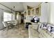 Inviting living space featuring dining area, comfortable seating, and tile floors for easy maintenance at 17200 W Bell Rd # 812, Surprise, AZ 85374