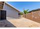 The backyard has a concrete patio with a block wall and gated access to the side yard at 17401 N 16Th Ave, Phoenix, AZ 85023