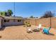 This backyard boasts a fire pit, seating, and xeriscaping, an ideal setting for gatherings at 17401 N 16Th Ave, Phoenix, AZ 85023
