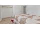 Bedroom showcasing bright natural light, wood look flooring, and white walls with closet at 17401 N 16Th Ave, Phoenix, AZ 85023