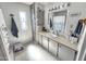 Updated bathroom features vanity with sink and good natural light at 18026 N Cave Creek Rd # 16, Phoenix, AZ 85032
