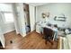 Bedroom/office featuring hardwood floors, closet, lots of natural light, with desk and office furnishings at 18026 N Cave Creek Rd # 16, Phoenix, AZ 85032