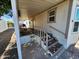 A covered front porch has plenty of space for seating, protection from the elements, and a secure entrance to the home at 18026 N Cave Creek Rd # 16, Phoenix, AZ 85032