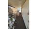 The front porch extends the length of the home, is covered, and offers an outdoor seating area at 18026 N Cave Creek Rd # 16, Phoenix, AZ 85032