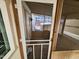 The interior of a screen door leads to the home's outdoor patio at 18026 N Cave Creek Rd # 16, Phoenix, AZ 85032