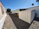 Exterior view showing a storage unit beside an accessible ramp leading up to the house at 18026 N Cave Creek Rd # 16, Phoenix, AZ 85032