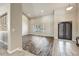 Inviting living room with wood-look flooring and neutral walls at 18207 W Sells Dr, Goodyear, AZ 85395