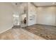 Open-concept living area featuring high ceilings and tile flooring throughout at 18207 W Sells Dr, Goodyear, AZ 85395
