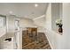 Upstairs loft area featuring a foosball table and staircase at 18207 W Sells Dr, Goodyear, AZ 85395