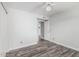 This is a bedroom with wood flooring and a ceiling fan at 1847 W Leah Ln, Gilbert, AZ 85233