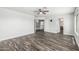 This bedroom has hard surface flooring and an open door to the en suite bathroom at 1847 W Leah Ln, Gilbert, AZ 85233
