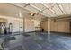 Spacious garage with built-in storage cabinets and ample room for vehicles and projects at 1847 W Leah Ln, Gilbert, AZ 85233