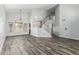 Spacious living room with high ceilings, wood-look tile flooring, and abundant natural light at 1847 W Leah Ln, Gilbert, AZ 85233