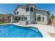Inviting pool area featuring a modern patio, perfect for relaxing and entertaining guests outdoors at 1847 W Leah Ln, Gilbert, AZ 85233