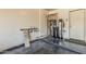 Equipped garage featuring a state-of-the-art water heater and storage system for modern convenience at 1847 W Leah Ln, Gilbert, AZ 85233