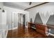 Functional home office with custom built-ins, hardwood floors, and ample natural light for productivity at 18820 N 33Rd Ave, Phoenix, AZ 85027