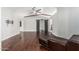 Open living area with hardwood floors, vaulted ceiling, and sliding barn doors for a modern touch at 18820 N 33Rd Ave, Phoenix, AZ 85027