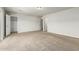 Bedroom with carpet, neutral paint, a closet, and a white door at 2000 N 36Th St # 17, Phoenix, AZ 85008