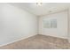 Cozy bedroom with neutral carpet and a bright window at 2000 N 36Th St # 17, Phoenix, AZ 85008