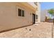 A cozy backyard area with neutral tones and a private entrance, perfect for relaxing outdoors at 2000 N 36Th St # 20, Phoenix, AZ 85008