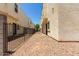 Backyard space featuring desert landscaping and metal fencing, creating a low-maintenance outdoor area at 2000 N 36Th St # 20, Phoenix, AZ 85008