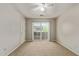 Bedroom with fan and patio door at 2000 N 36Th St # 20, Phoenix, AZ 85008