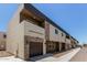 Modern townhome community featuring stacked stone accents and a neutral color scheme at 2000 N 36Th St # 20, Phoenix, AZ 85008
