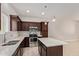 Modern kitchen featuring stainless steel appliances, a white countertop, and an island at 2000 N 36Th St # 20, Phoenix, AZ 85008
