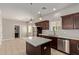 Spacious kitchen with island, stainless appliances and quartz countertops at 2000 N 36Th St # 20, Phoenix, AZ 85008