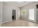 Living room leading to bathroom, kitchen, and backyard access at 2000 N 36Th St # 20, Phoenix, AZ 85008