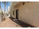 Backyard featuring low-maintenance gravel landscaping, complemented by a neutral-toned house exterior at 2000 N 36Th St # 35, Phoenix, AZ 85008